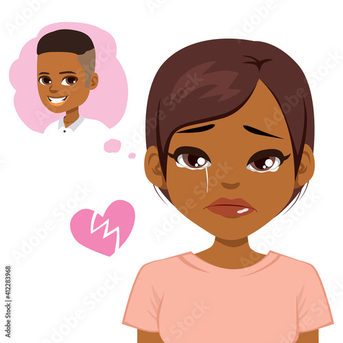 Sad rejected black teenager girl with heart broken thinking in the boy she loves