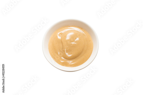 Mushroom sauce in a bowl isolated on white background.