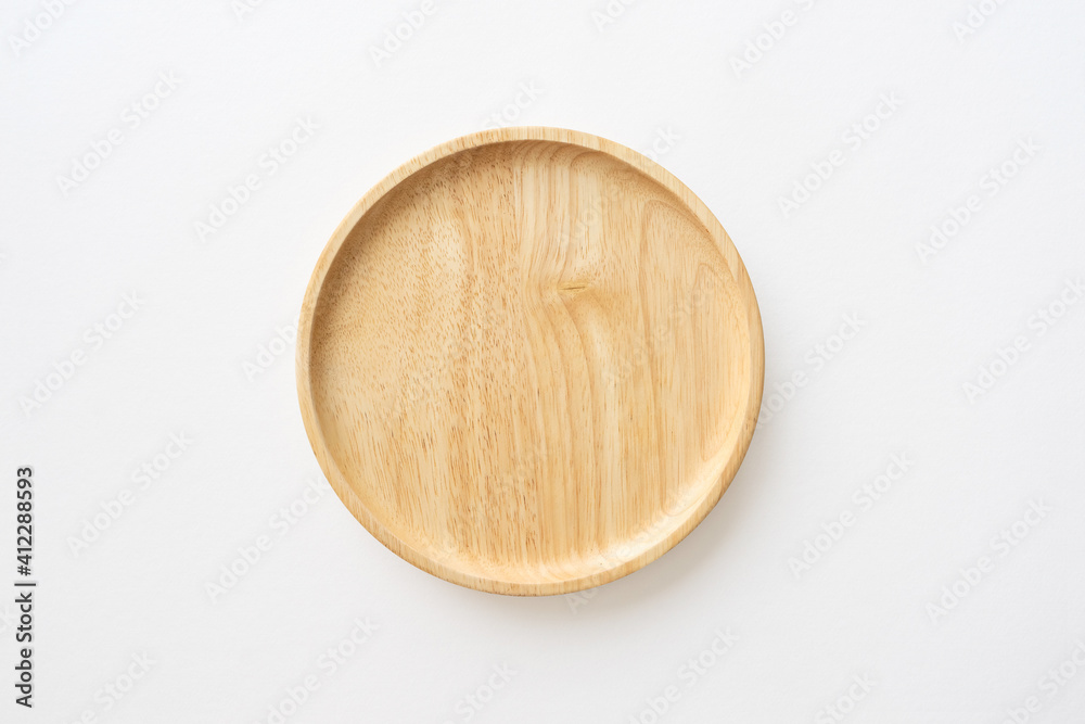 Top view of wooden dish for kitchen background. Close-up. Top view of wooden dish for kitchen background. Close-up.