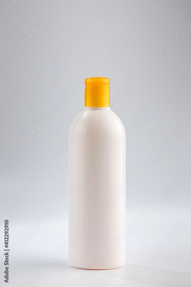 Bottle of hair shampoo on a white background Bottle of hair shampoo on a white background