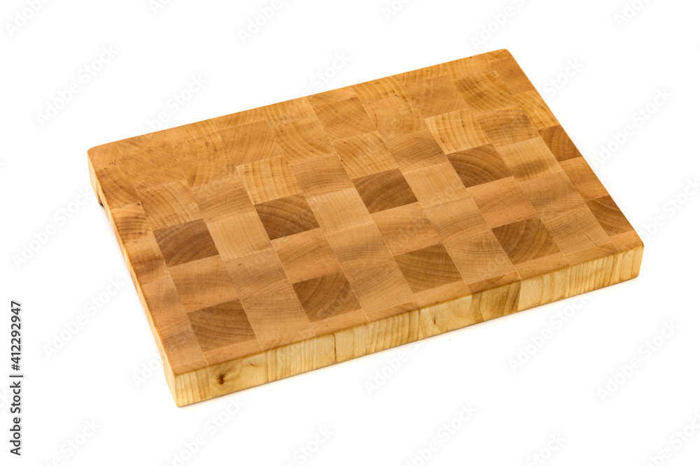 Wooden cutting board isolated on white.