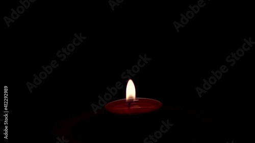 candle in night, a luminous candle in the dark