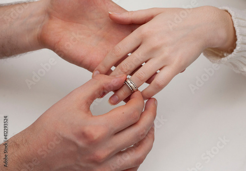 The man proposes. The husband puts the ring on his wife s finger. Valentine s Day