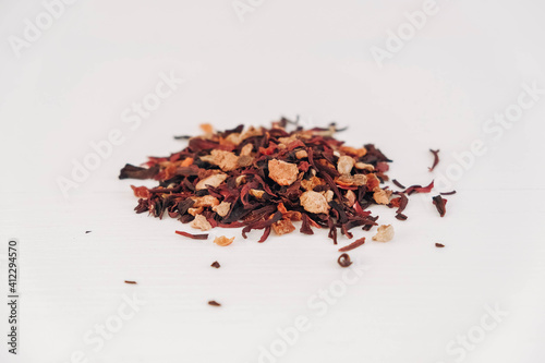 Dry fruit tea scattered on a white table background. Copy, empty space for text