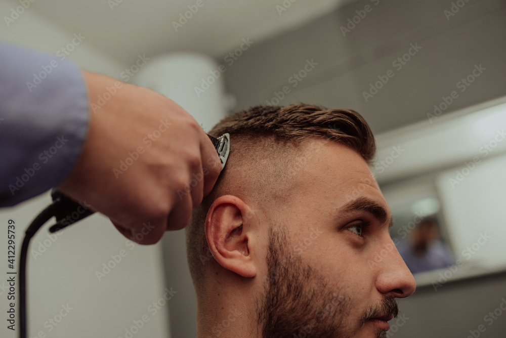 Young Man in Barbershop Hair Care Service ConceptYoung Man in Barbershop Hair Care Service Concept Young Man in Barbershop Hair Care Service ConceptYoung Man in Barbershop Hair Care Service Concept