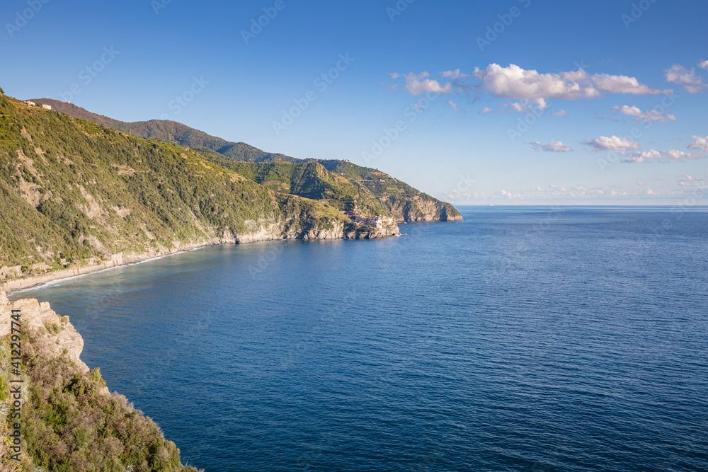 Italian Riviera. View of Manarola village from Corniglia village in Cinque Terre. Postcard view.