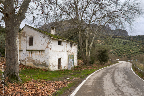 road and house in the natural park of the Subbetic mountains in Cordoba. Spain