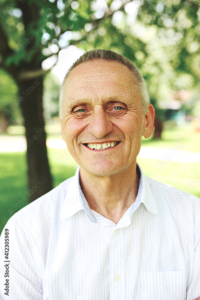 Portrait of an elderly man smiling Portrait of an elderly man smiling