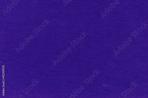 Cardboard purple abstract pattern texture close-up. Retro old paper background. Grunge concrete wall. Vintage blank wallpaper.