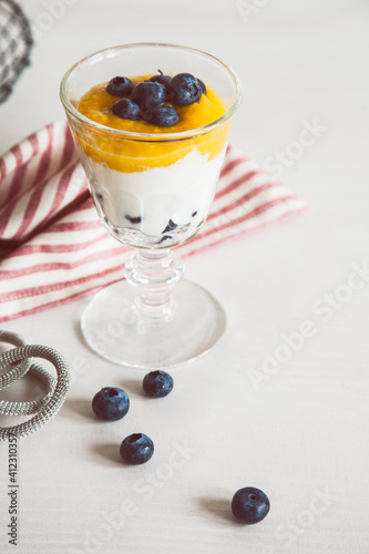 Homemade Yogurth with Fresh Mango and Blueberries photo