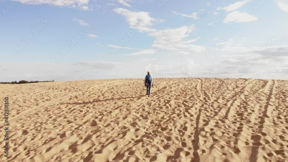 Woman at sand badland. Deforestation disaster, change climate, global warming problem. Former pine forest in Ukraine.