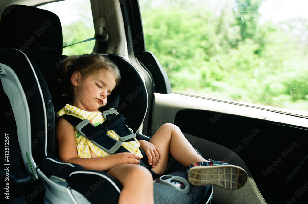little girl sleeping in carseat Stock Photo Adobe Stock
