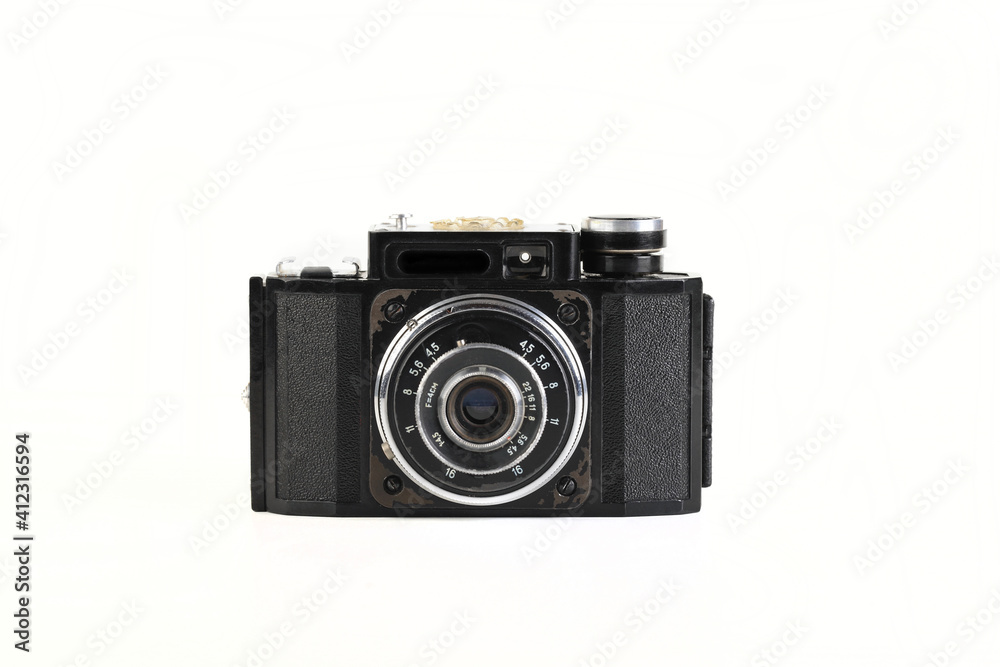 Old 35mm bakelite scaling film camera on white background. Old 35mm bakelite scaling film camera on white background.