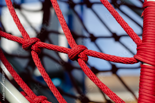 Synthetic rope. Rope knot. Marine rope. Harness. Equipment for climbers.
