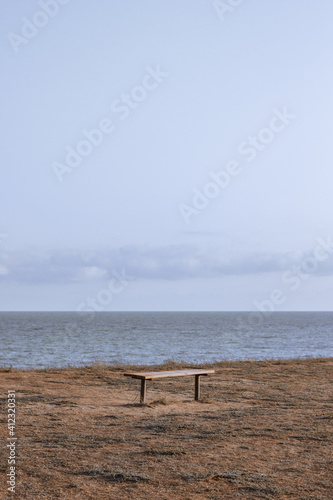 wooden bench on the beach