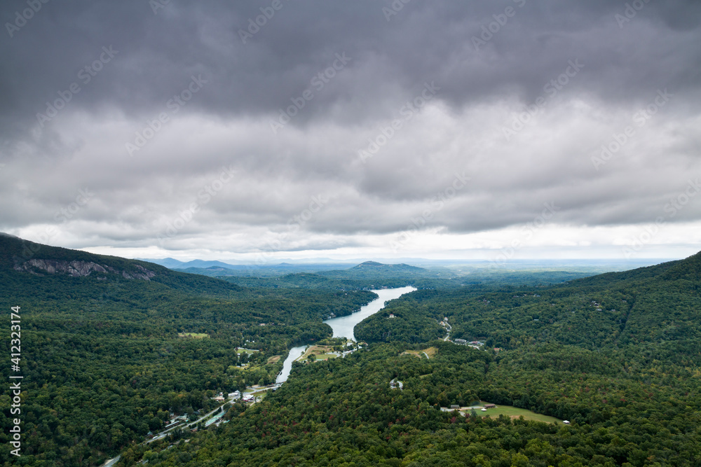 Storm clouds over a river valley Storm clouds over a river valley