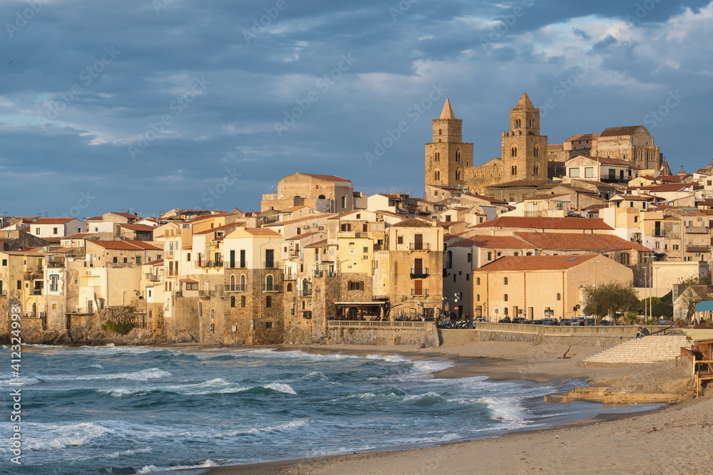 Cefalu old town cityscape at sunset in province of Palermo, Sicily, Italy