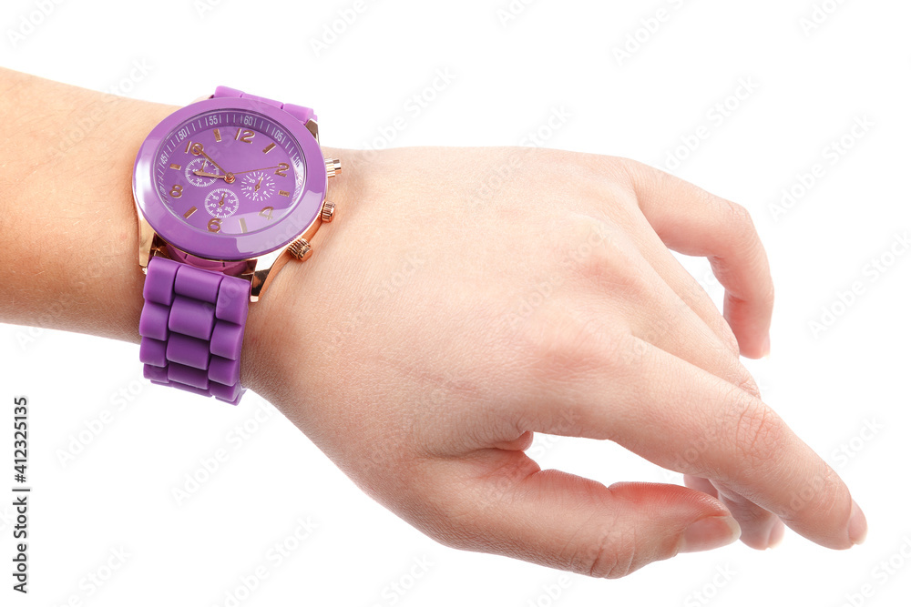 Fototapeta premium Wrist watch on a cute female hand isolated on white background