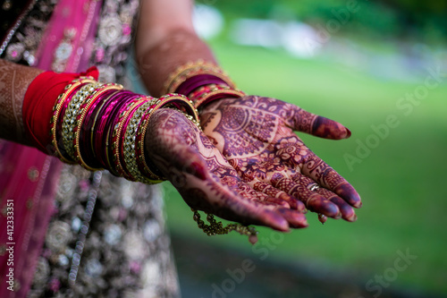 Indian Hindu bride's wedding henna mehendi menhdi hands close up