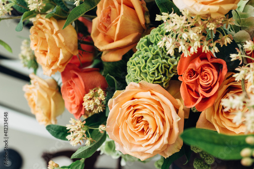 Bouquet of roses at a fall decorated table photo