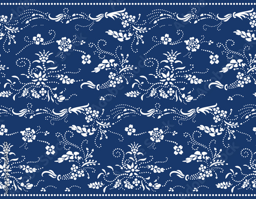 Katazome floral seamless border. Traditional Japanese technique using a katagami stencil. Oriental ornamental pattern. Shibori arranged in small dots to form a flower branch border design. photo