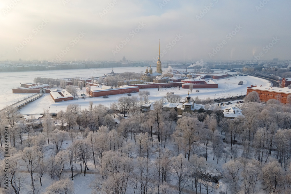 Aerial view of Peter and Pavel's fortress in winter with hoarfrost on the trees, the main destination of Petersburg