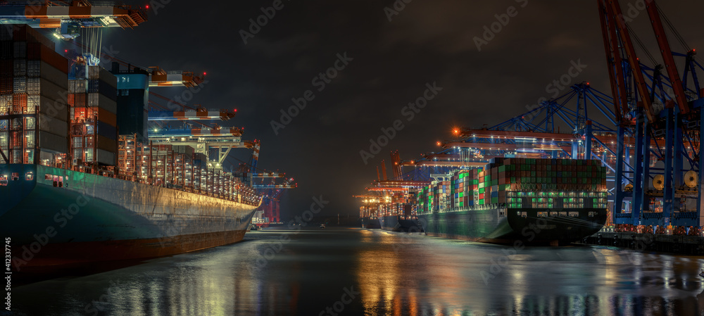 Container terminal in the port of Hamburg in the evening 