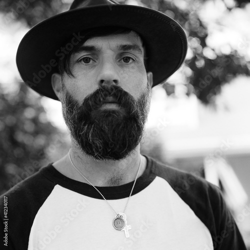 Black and white portrait of a handsome man with a beard