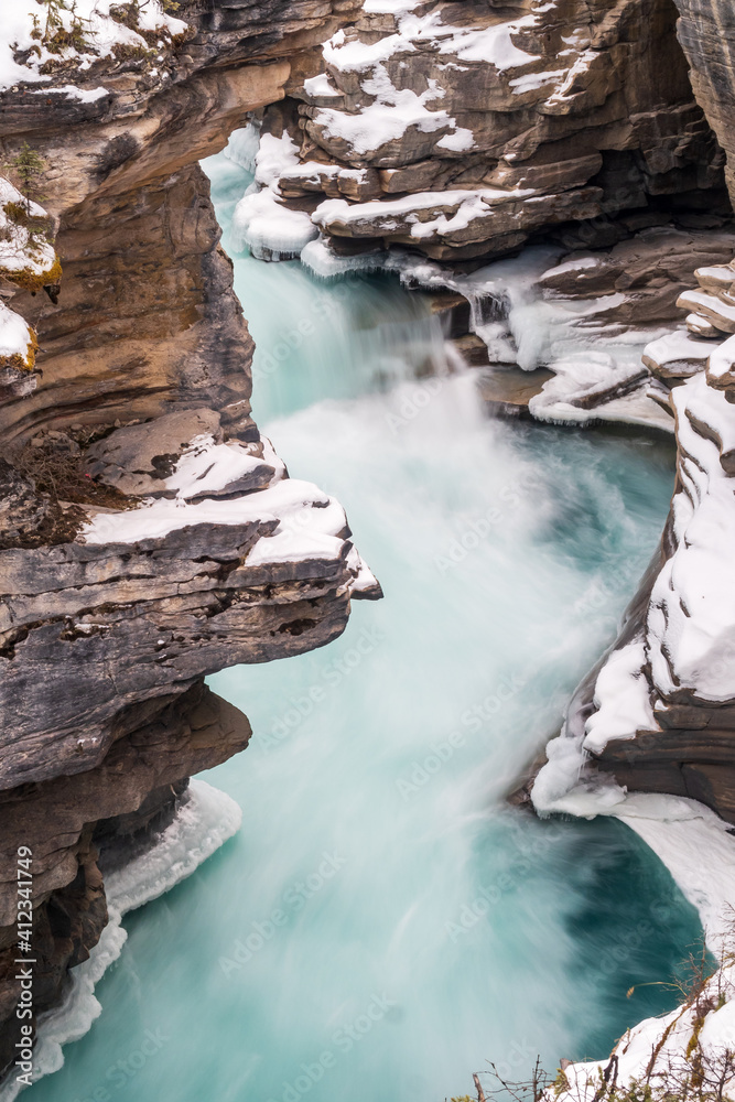Beautiful view of the frozen Athabasca Falls in winter, Canada