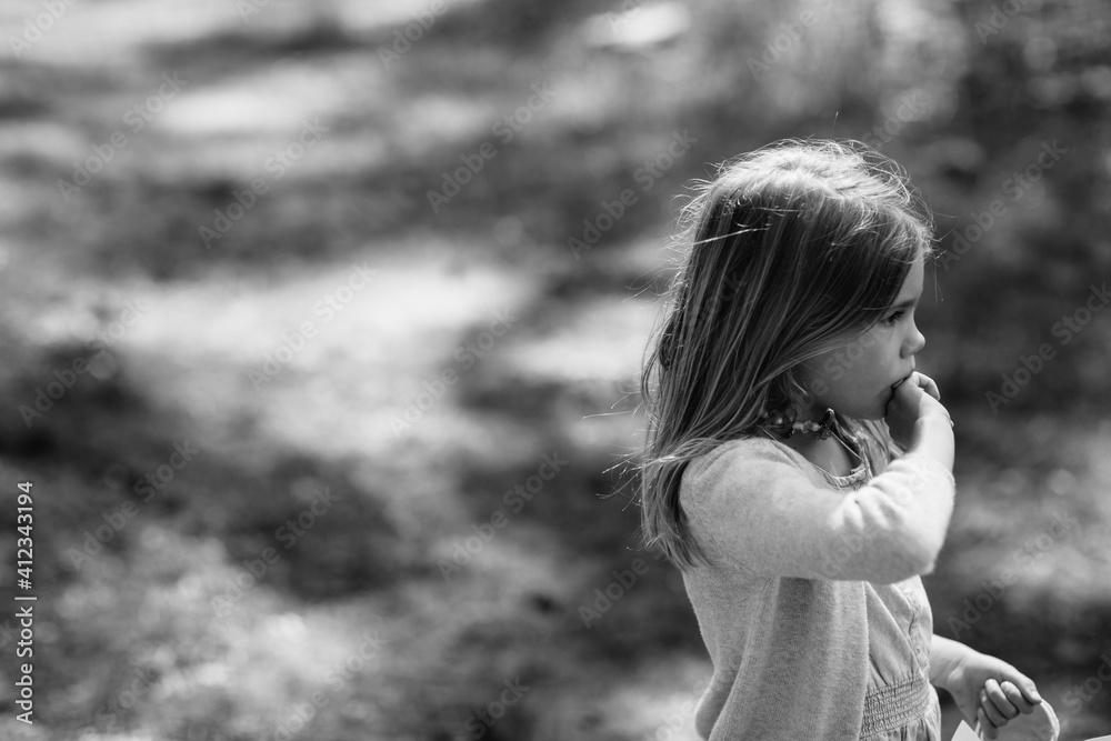 Candid Black and White portrait of child outside Candid Black and White portrait of child outside