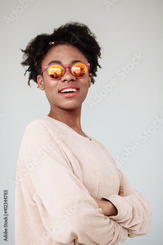 Studio portrait of afro teen model