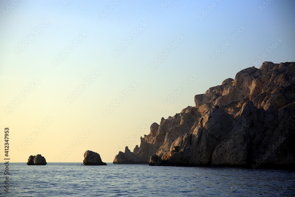 Selective focus on the rocks on the blue Mediterranean sea, Parc National des Calanques, Marseille, France
