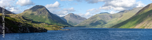 Fotografie Mountain views over lake panorama