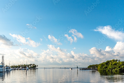 A beautiful calm day at Matheson Hammock Marina in Miami. Boat heads out on a calm Summer day.