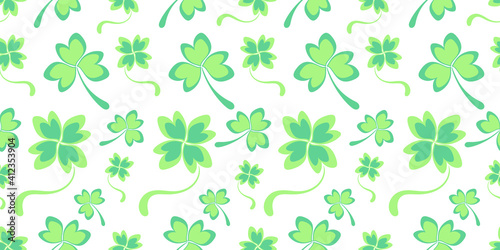 Light green seamless pattern with double shamrock leaves and clover hearts. Spring green background for St. Patrick's Day. Holiday background, wallpaper, wrapping paper, fabric, hand drawn texture