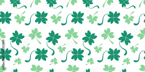 Spring green seamless background for St. Patrick's Day. Mint simple shamrock and clover pattern. Flat wallpaper, wrapping paper, fabric, textile, holiday print for different textures and surface