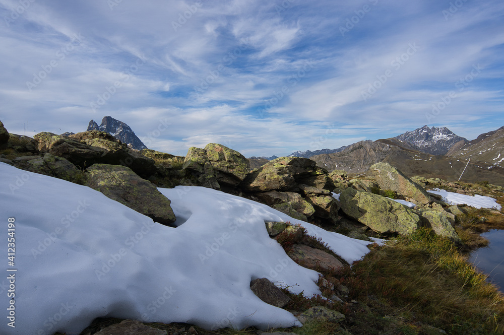 The Portalet with the bottom the Anayet peak. Concept famous mountains of the Aragonese Pyrenees, in Spain The Portalet with the bottom the Anayet peak. Concept famous mountains of the Aragonese Pyrenees, in Spain