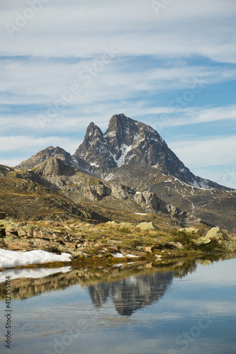 Ibon de Anayet and the Portalet with the bottom the Anayet peak. Concept famous mountains of the Aragonese Pyrenees