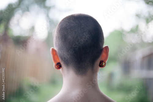 Girl with Shaved Head photo