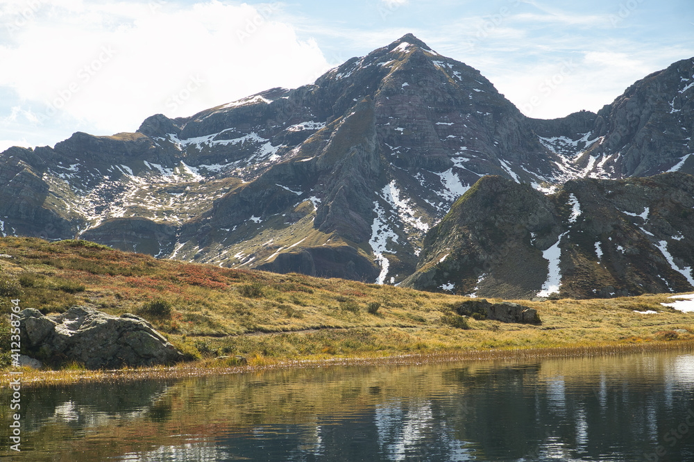 Ibon de Anayet and the Portalet with the bottom the Anayet peak. Concept famous mountains of the Aragonese Pyrenees Ibon de Anayet and the Portalet with the bottom the Anayet peak. Concept famous mountains of the Aragonese Pyrenees