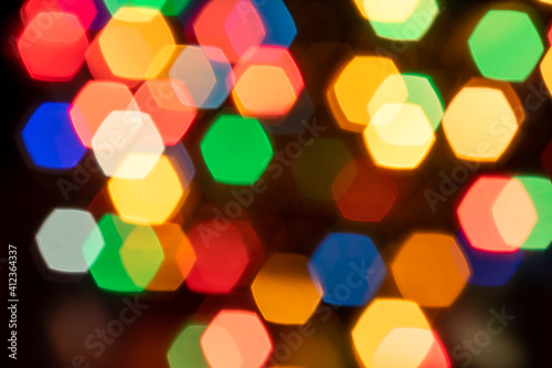 Defocused colorful christmas lights. Magic in your heart.