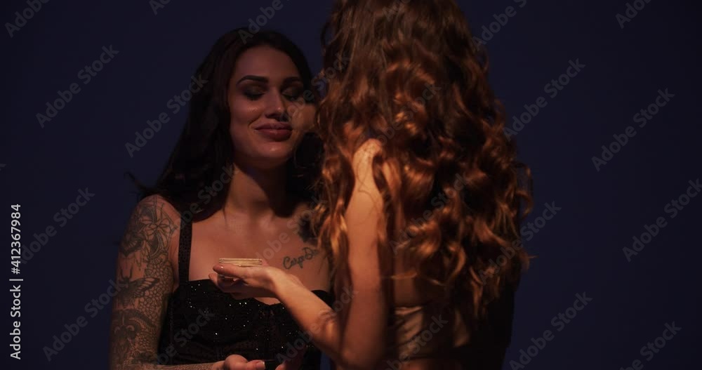 Model is smiling while a makeup artist is applying makeup on her, 4k Model is smiling while a makeup artist is applying makeup on her, 4k