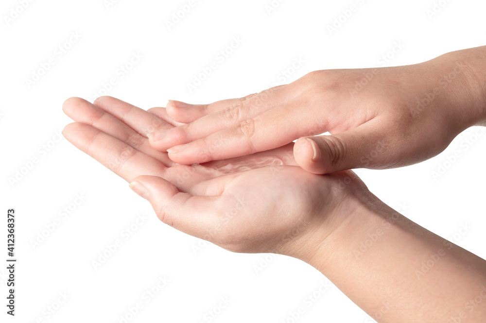 Woman hands using wash hand sanitizer gel to prevention virus epidemic or antibacterial on white background. Woman hands using wash hand sanitizer gel to prevention virus epidemic or antibacterial on white background.