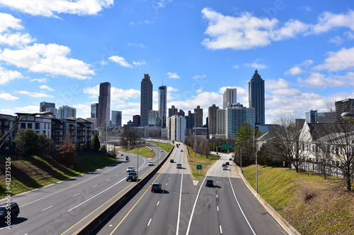 Downtown Atlanta skyline, highway, and landscaping 