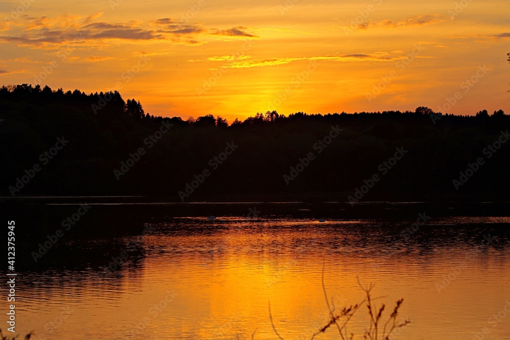 Fototapeta premium sunset over lake