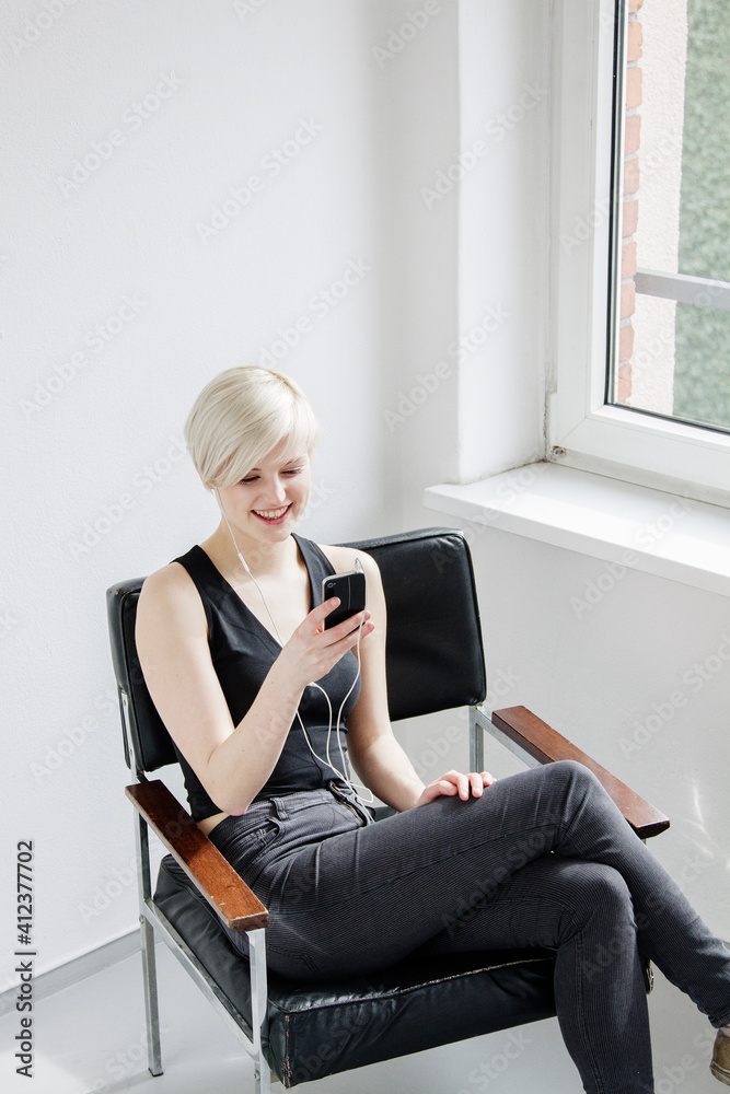 Woman chatting on smart phone Woman chatting on smart phone