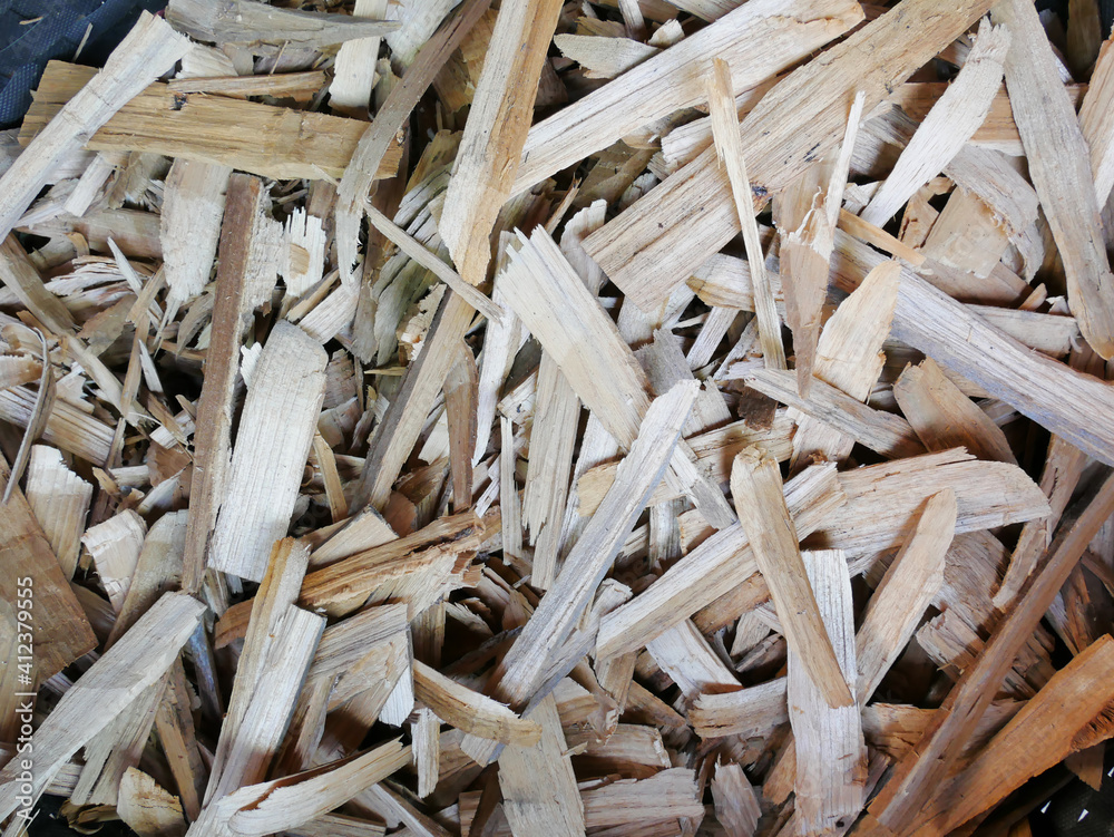 Firewood background - chopped firewood on a stack. Dry chopped firewood logs in a pile. Firewood background - chopped firewood on a stack. Dry chopped firewood logs in a pile.