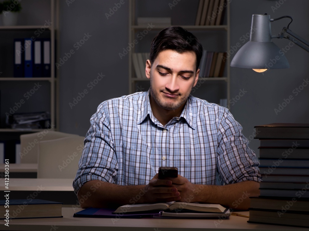 Student preparing for exams late at night Student preparing for exams late at night