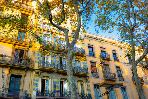 Colorful building with decorated Mayolica and Panot tiles along Las Ramblas in Barcelona Spain.