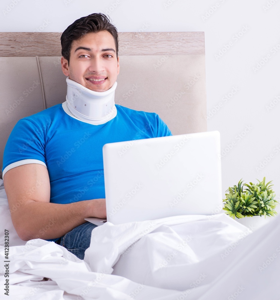 Young man with neck injury in the bed